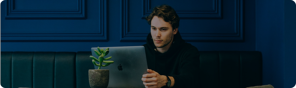 Professional man with plant